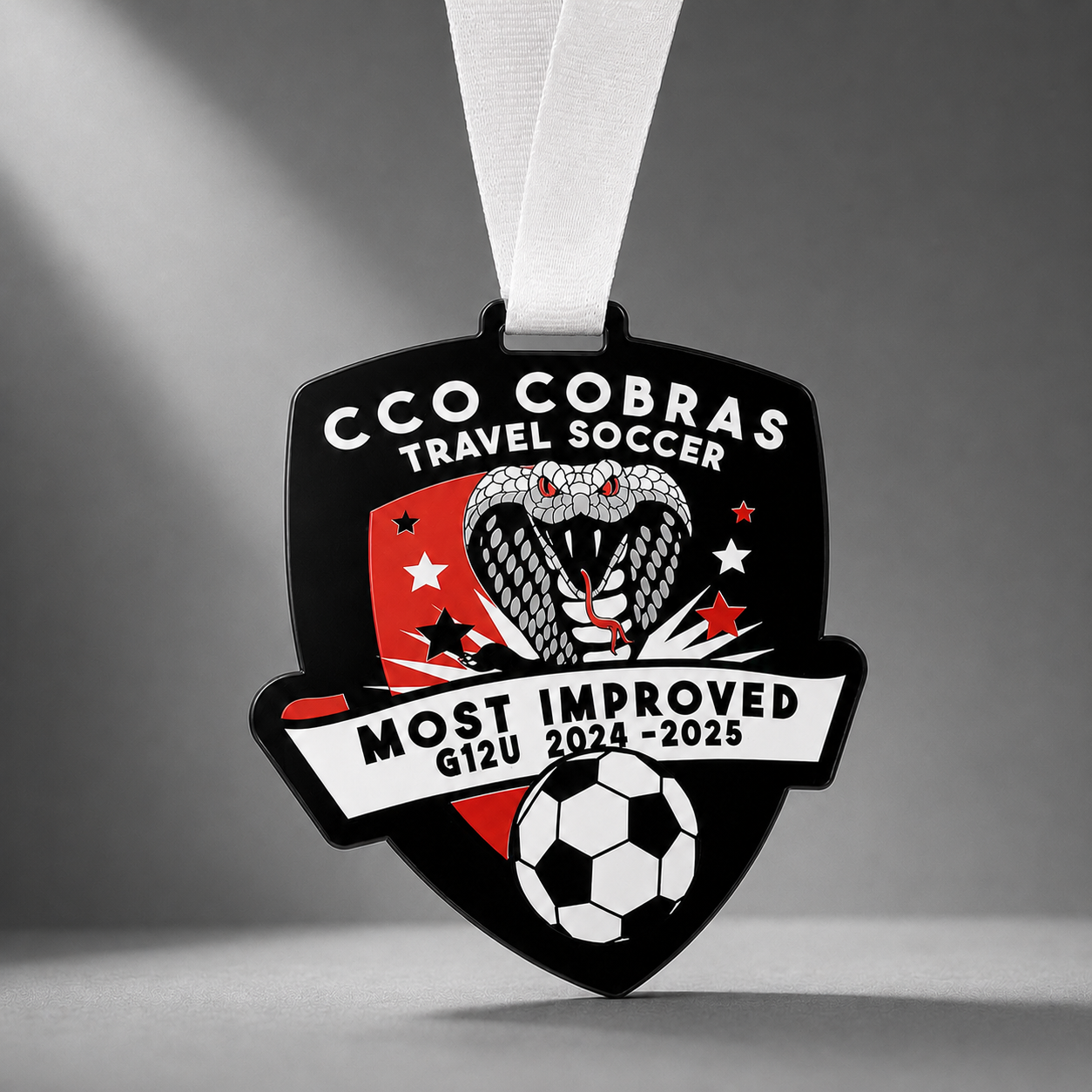 CCO Cobras travel soccer custom shield medal